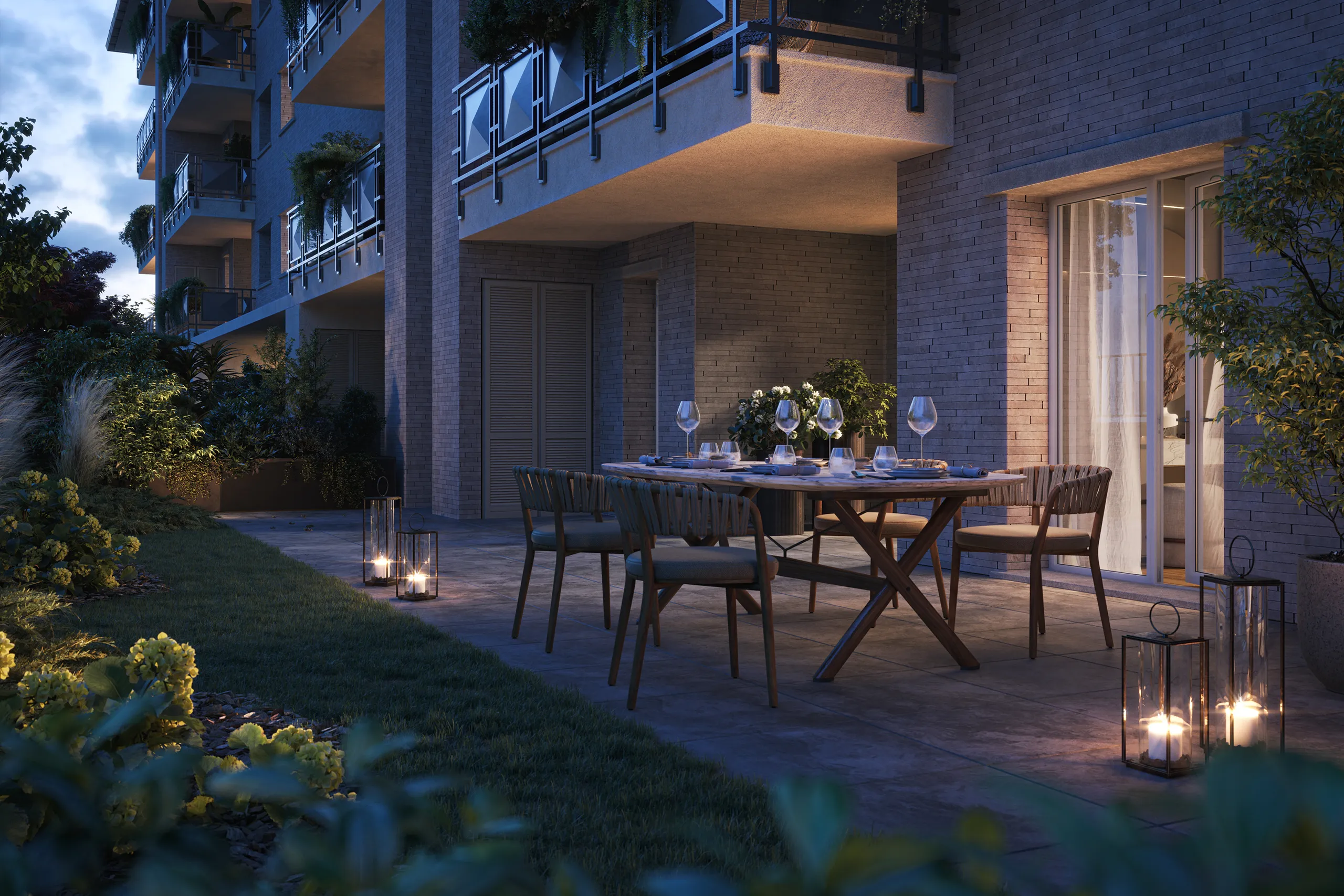 Terrazza privata di Clivia Living Pisana illuminata nelle ore serali, ideale per vivere gli spazi esterni in ogni momento della giornata.